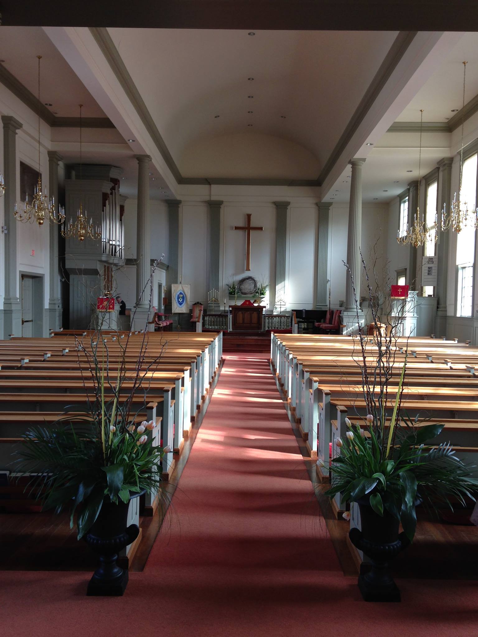Historic nave and red center aisle at Christ Church Episcopal Hudson